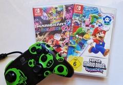 Zwei Mario Nintendo Switch Spiele neben einem Switch-Controller